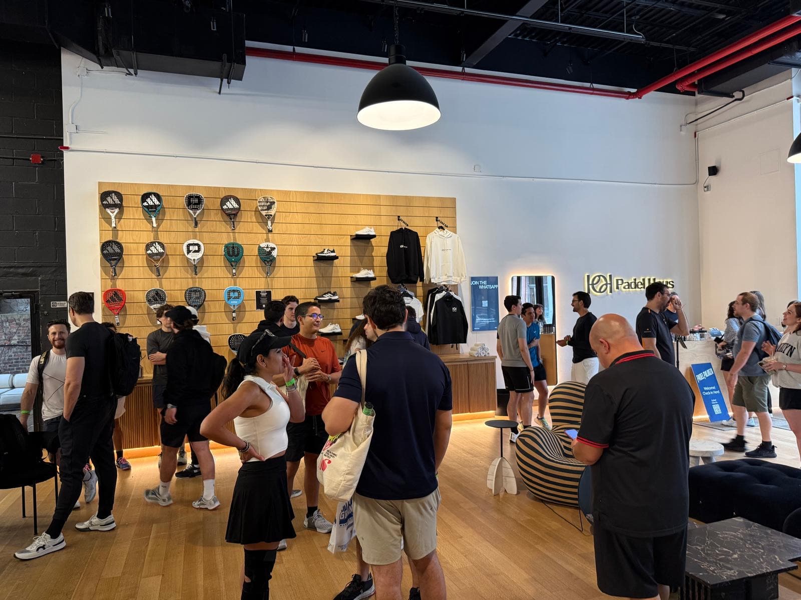 Founders mingling at a Pygma padel event